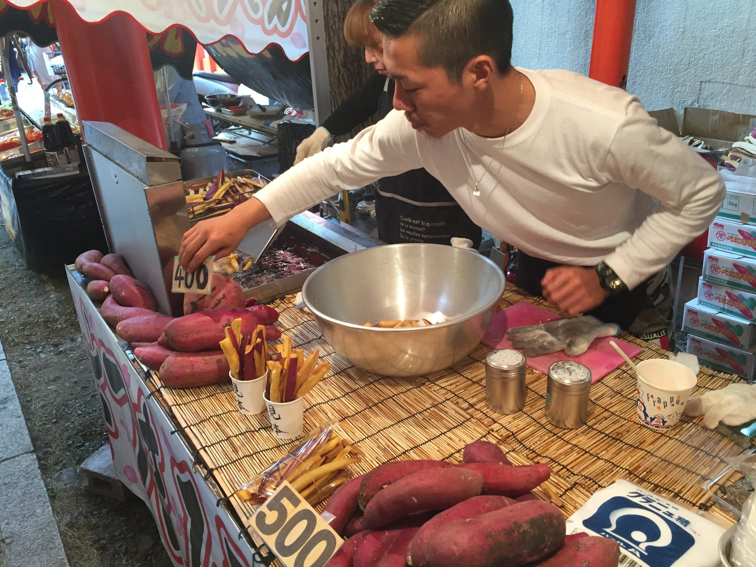 street vendor selling sweet potatoes in japan