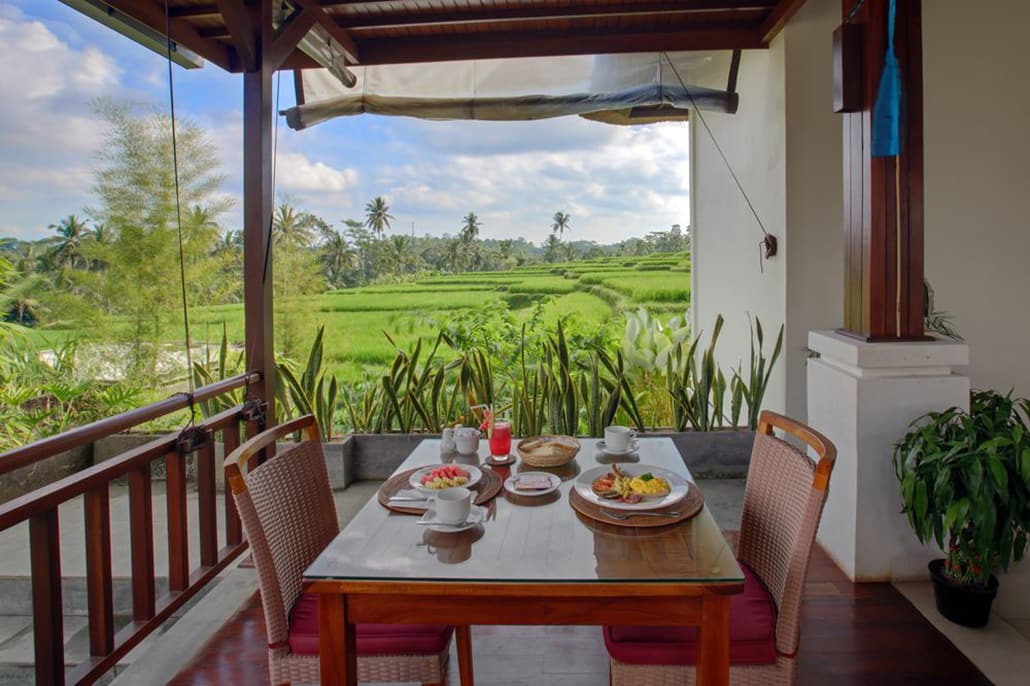 Outdoor dining area at Anusara Luxury Villas in Bali