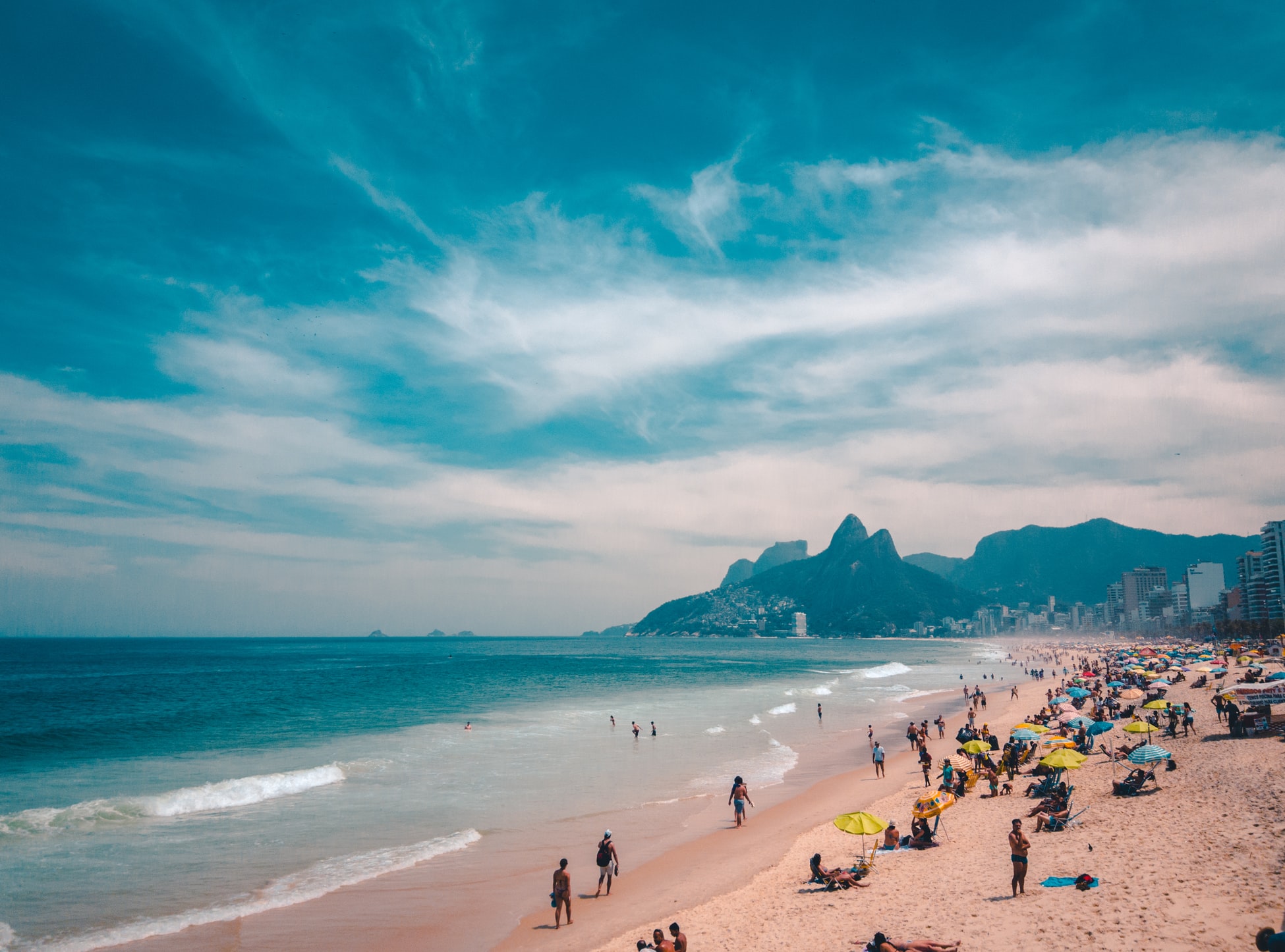 beach with lots of people rio de janeiro brazil