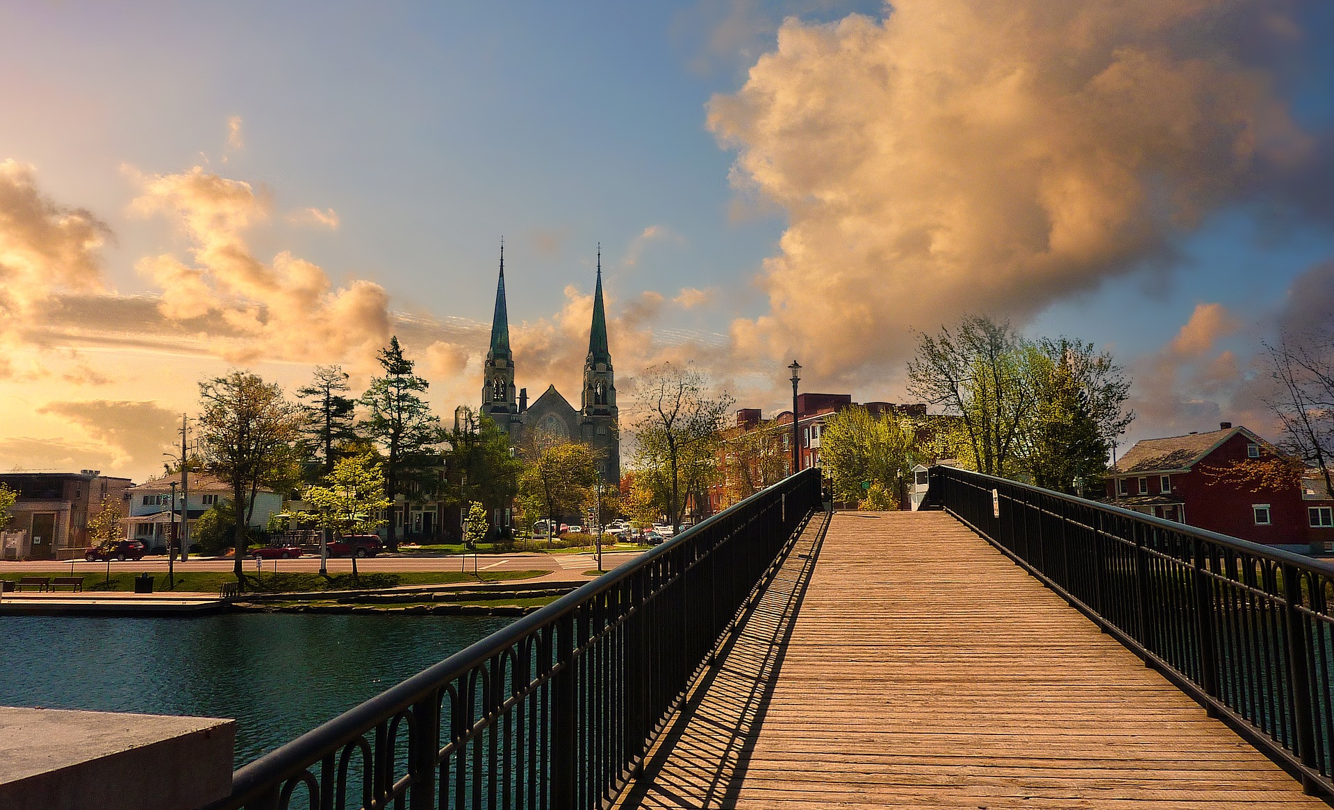 bridge over water in front of cathedral