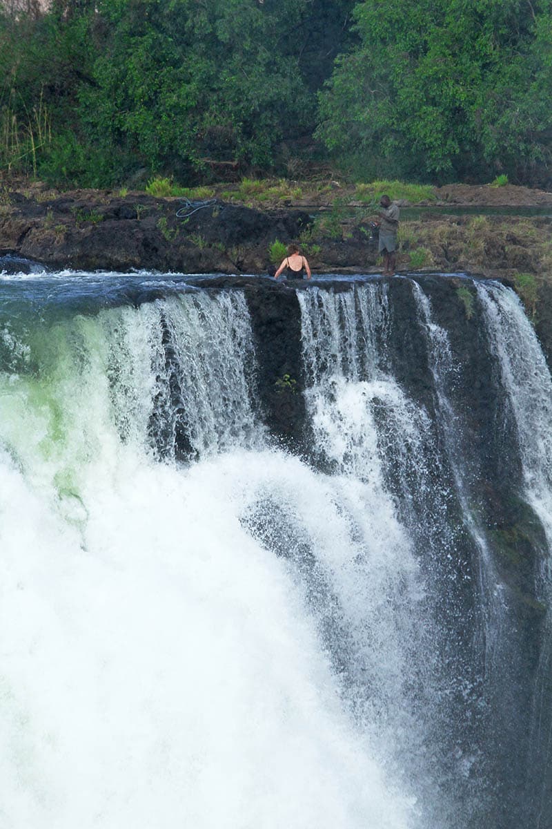 Swimming in Devil's Pool at the edge of Victoria Falls, Zambia