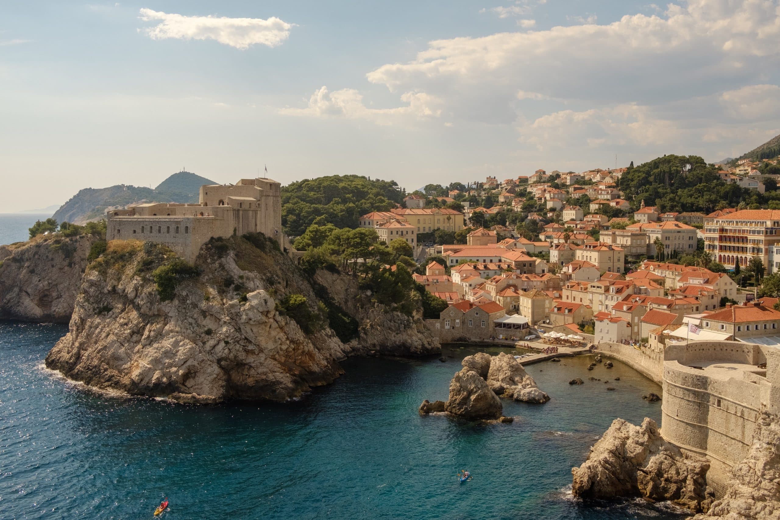 buildings and houses by the ocean