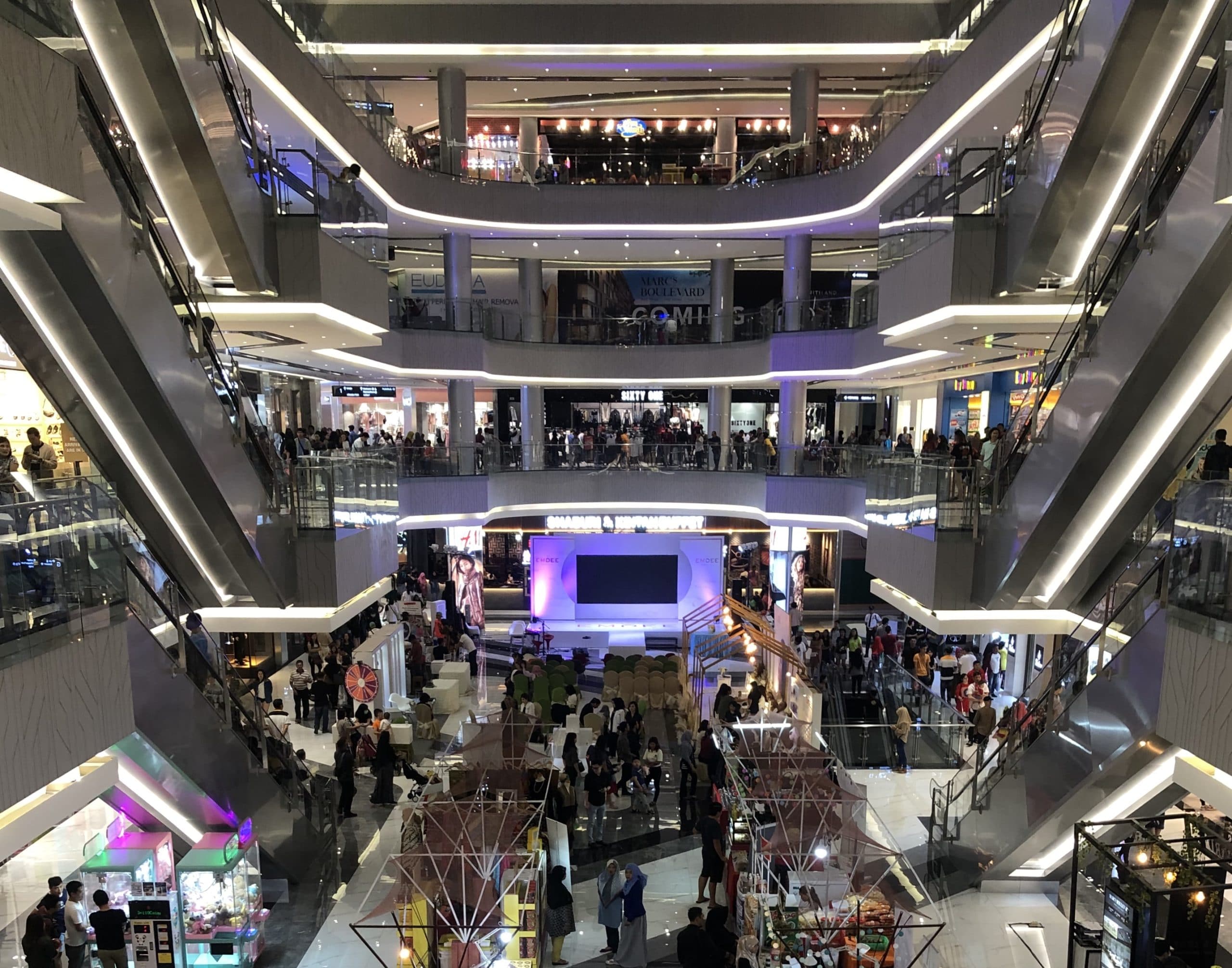 the many crowds on different levels at grand batam mall
