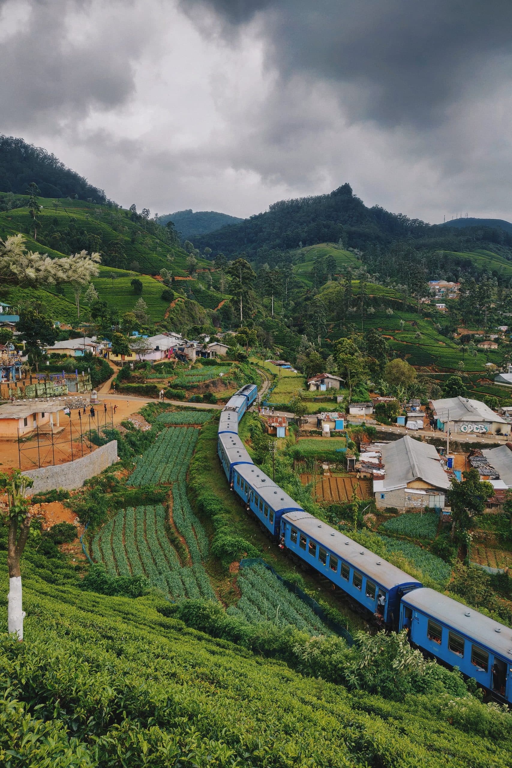 train going through small mountain village