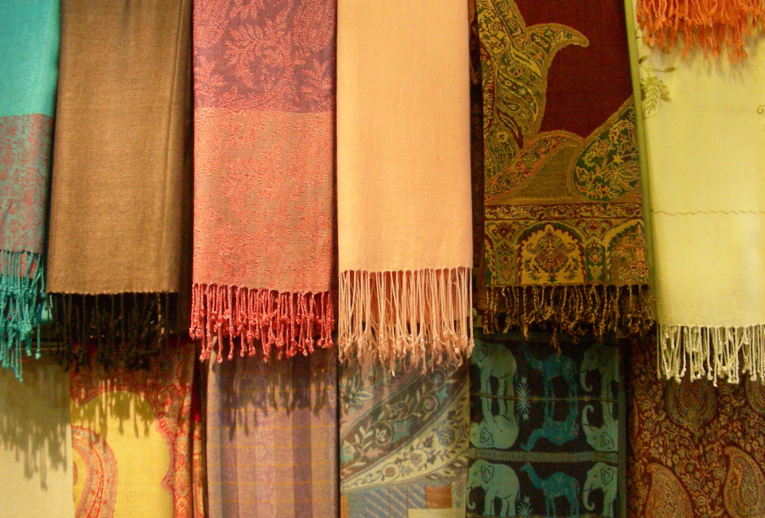 colourful pashminas seen at the market in Qatar