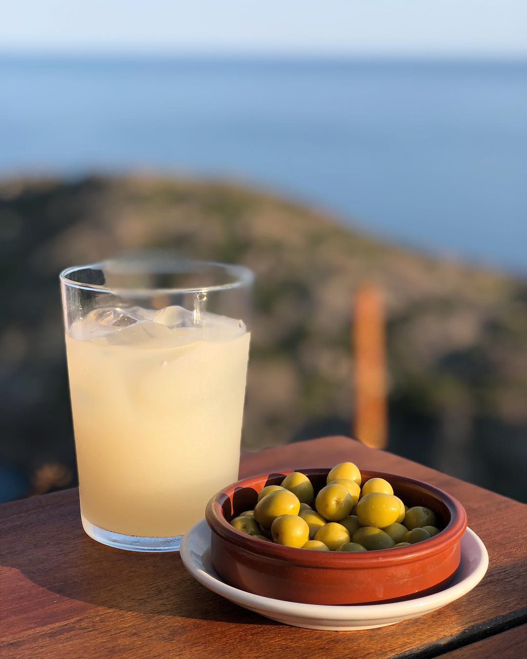 Local Pastis drink with olives
