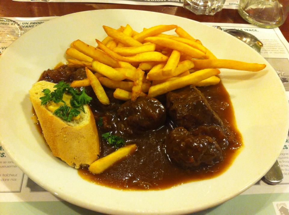 A dish of steak frites at a restaurant in Paris