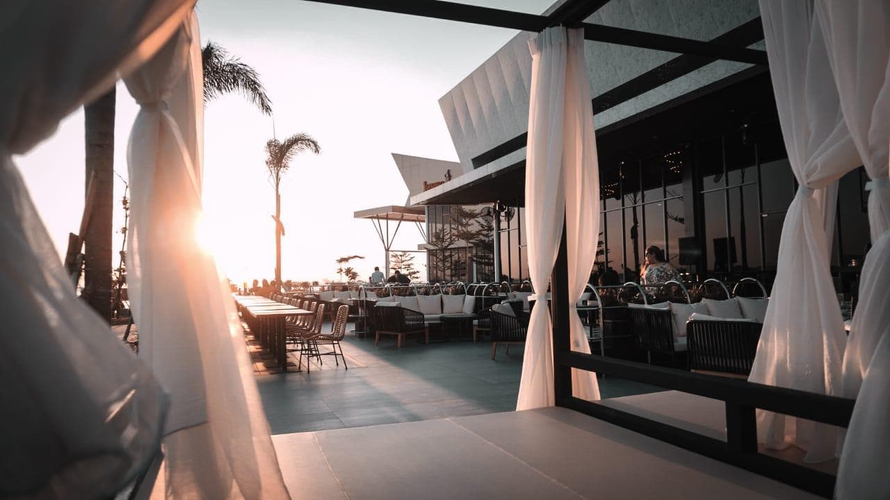 outdoor day bed with sunset view at nomad lounge