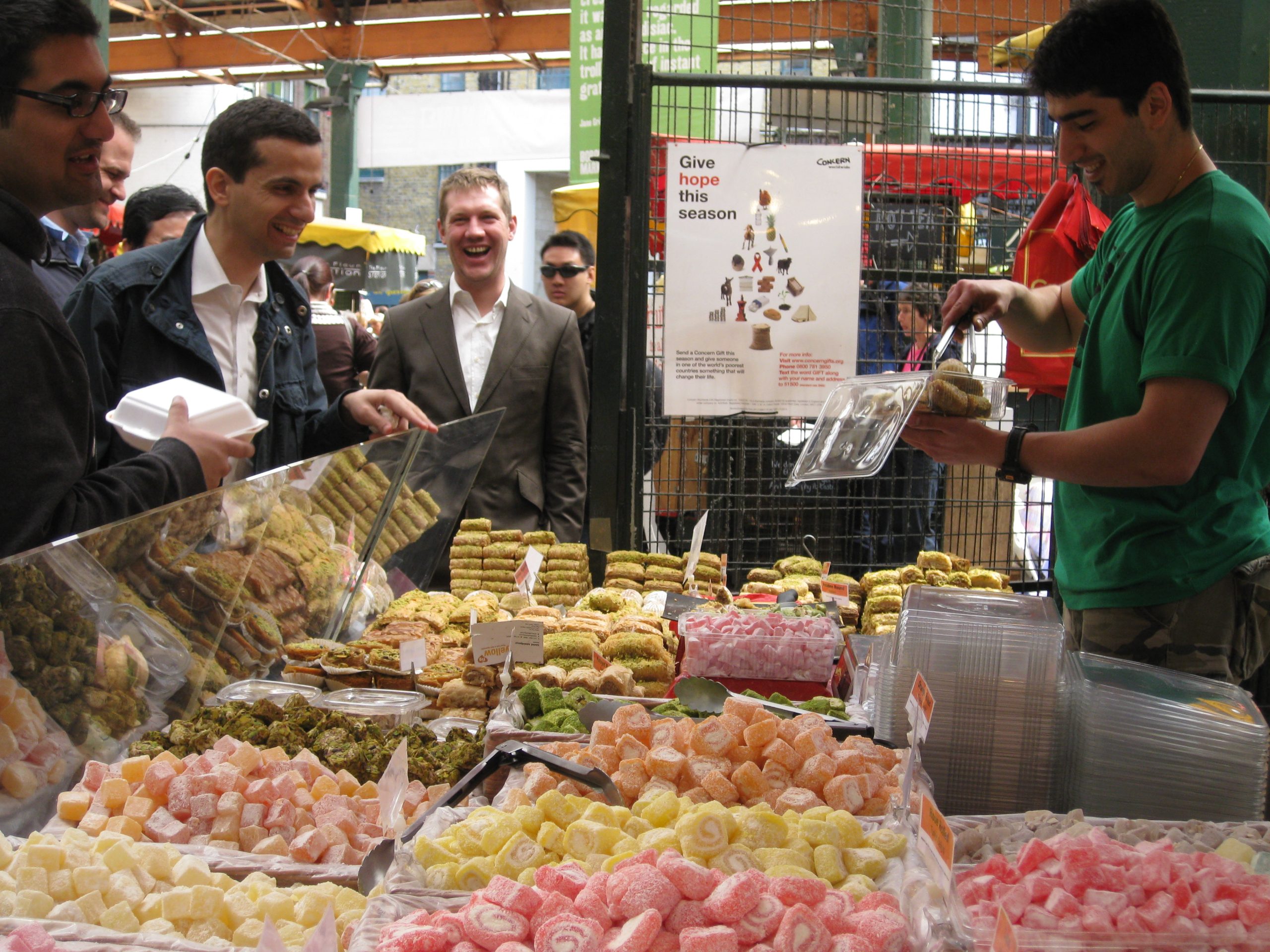 man selling sweets to customers