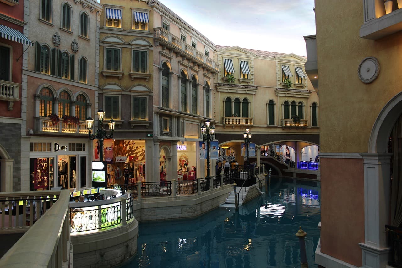 canal surrounded by buildings and shops